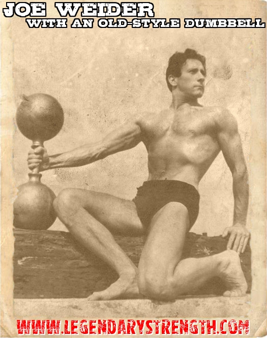 Posing with an old style dumbbell