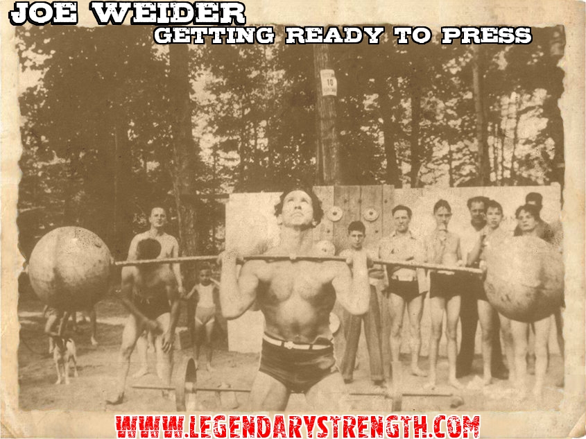 Joe Weider using an old style barbell